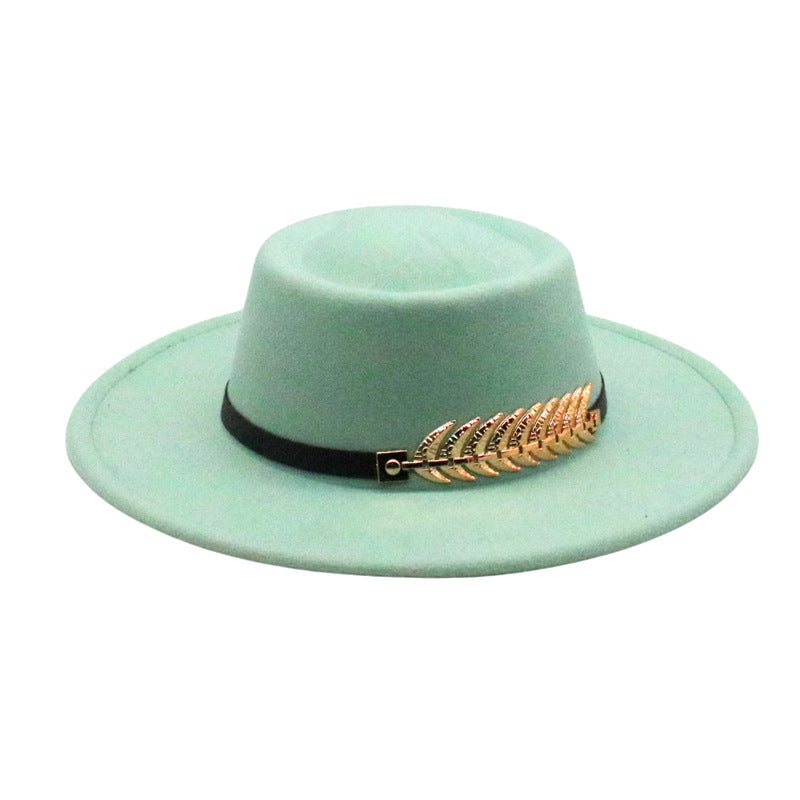 Mint green felt fedora hat by Stevvex with short brim, black band and gold laurel detail on Tampa Home & Garden Store