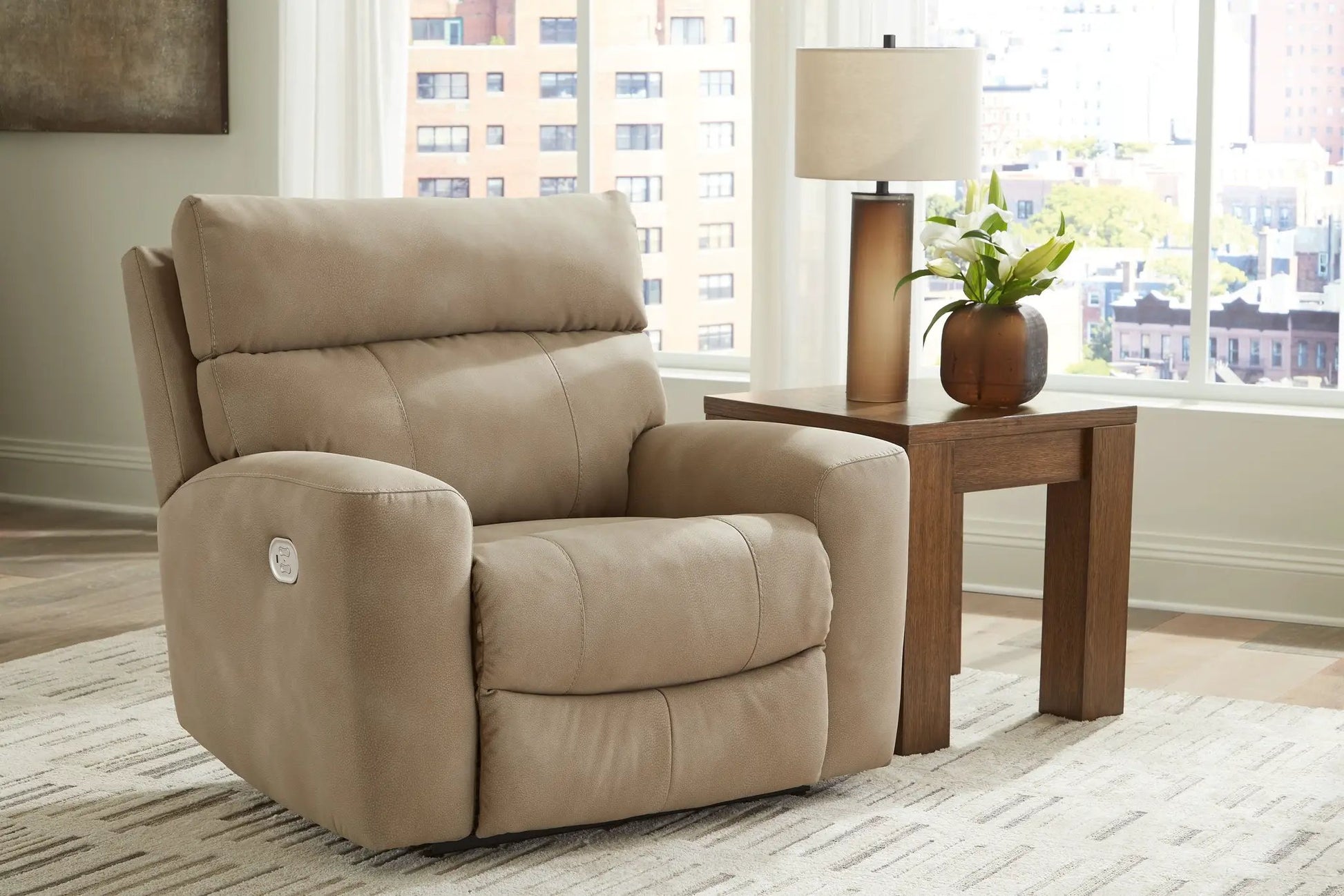 Next-Gen Durapella power recliner beige with adjustable headrest beside a wooden side table on Tampa Home & Garden Store