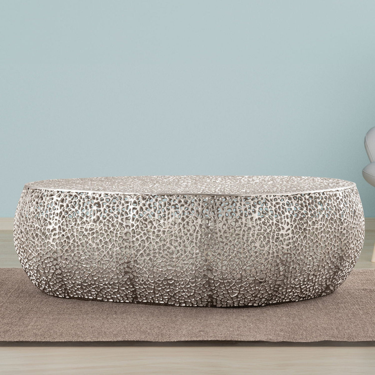 Oval coffee table with aluminum frame in pearl silver finish and lattice surface on Tampa Home & Garden Store