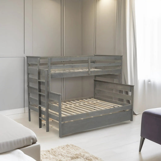 Gray metal bunk bed, twin over full with twin trundle, in a light bedroom near wardrobes on Tampa Home & Garden Store