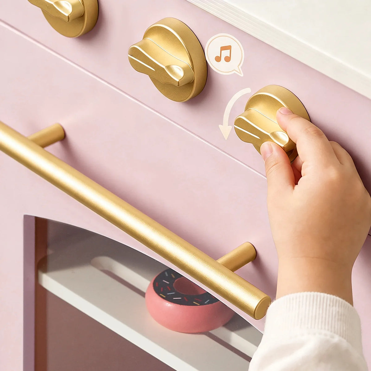 Tiny Land INC wooden play kitchen with storage in pink exterior and gold knobs on Tampa Home & Garden Store