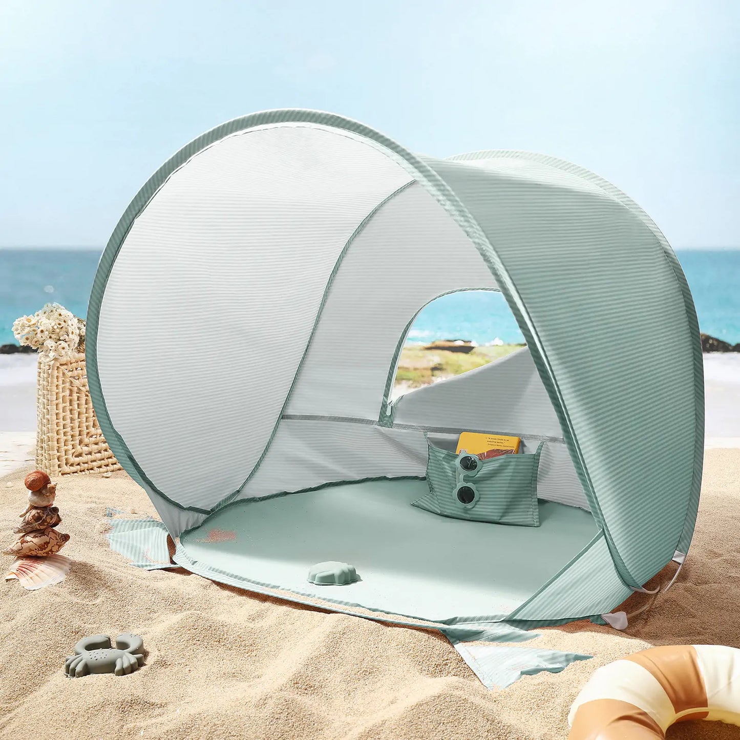 Tiny Land INC round pop-up beach tent in pale green with front pocket organizer on Tampa Home & Garden Store