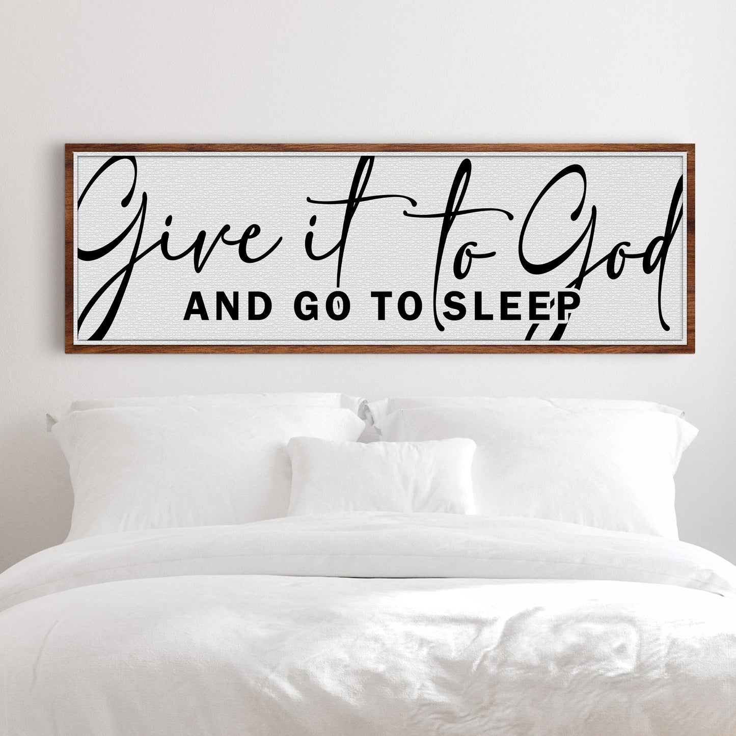 Canvas sign Give It To God And Go To Sleep with black script on white canvas in wood frame on Tampa Home & Garden Store