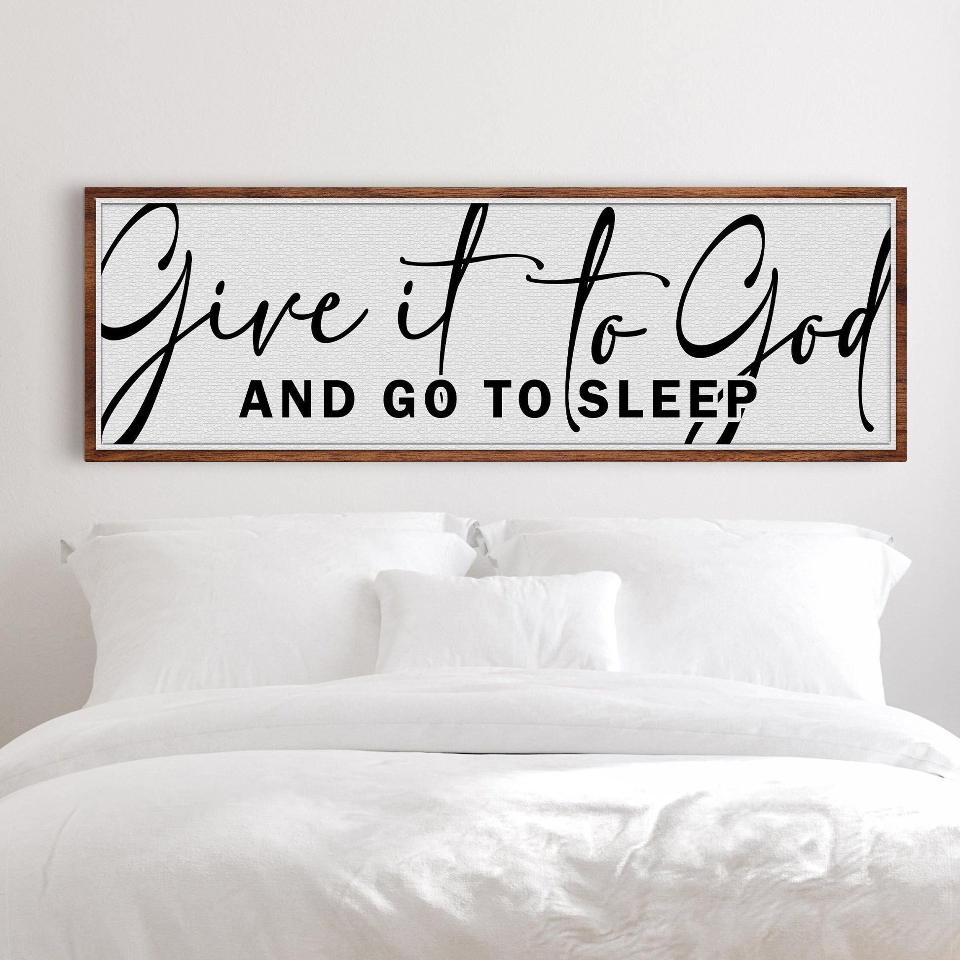 Canvas sign Give It To God And Go To Sleep with black script on white canvas in wood frame on Tampa Home & Garden Store