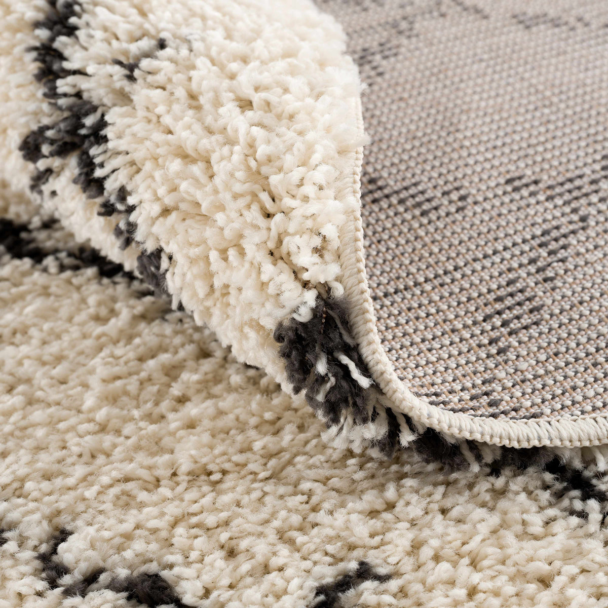 Pahala Moroccan Shag Area Rug by Boutique Rugs in ivory cream with black accents on Tampa Home & Garden Store