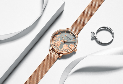 Stevvex watch with decoupage flower dial and waterproof rose-gold mesh strap; ring visible on Tampa Home & Garden Store