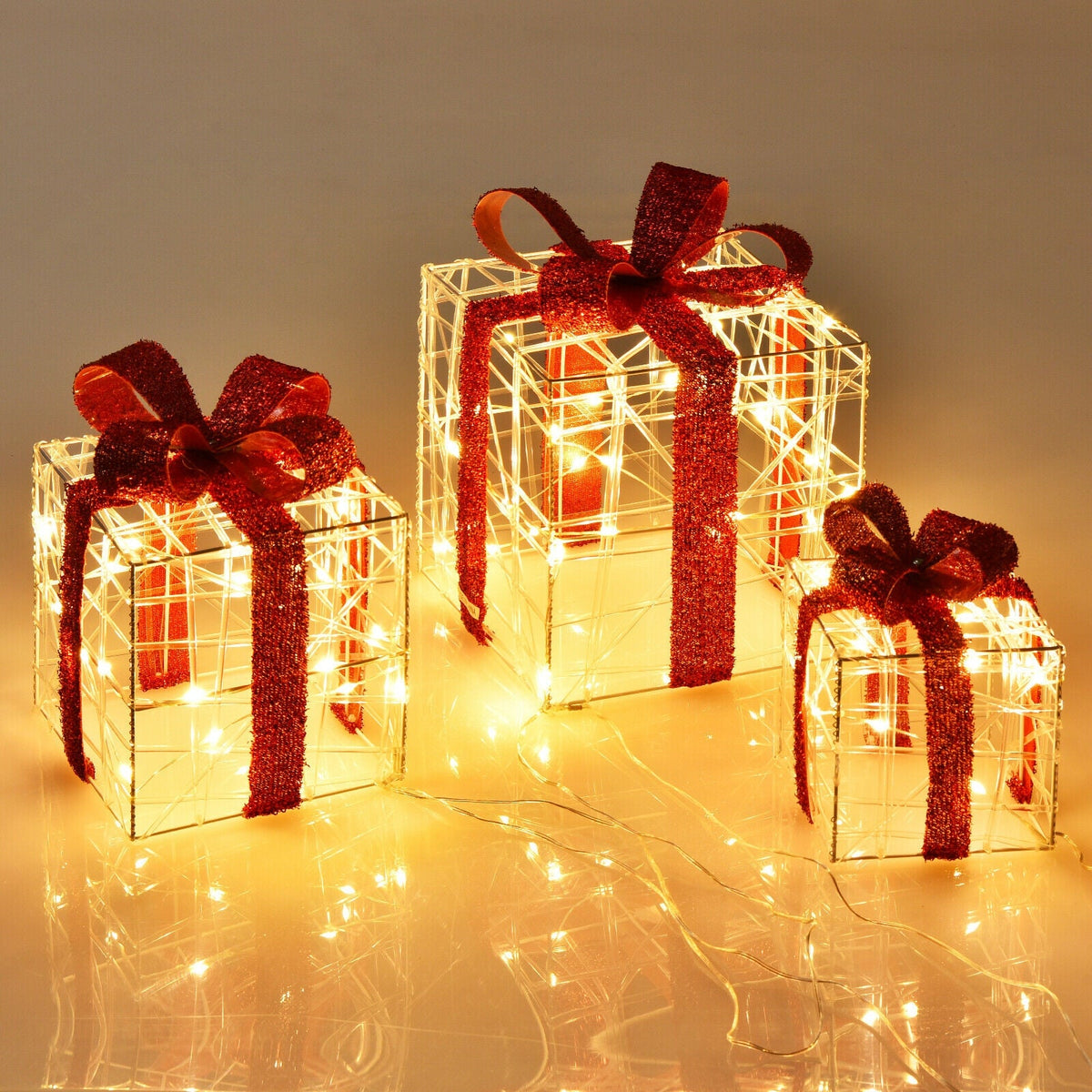 3-piece lighted gift box set with 60 LED lights, warm white glow and red glitter ribbons for indoor outdoor decor on Tampa Home & Garden Store