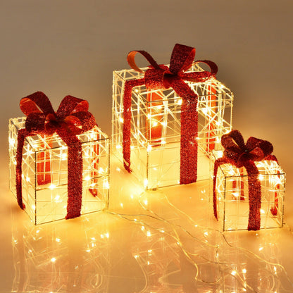 3-piece lighted gift box set with 60 LED lights, warm white glow and red glitter ribbons for indoor outdoor decor on Tampa Home & Garden Store
