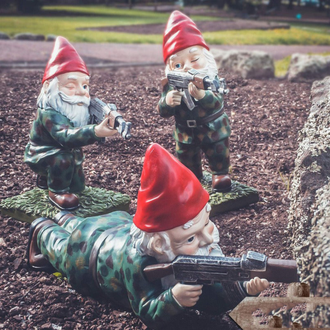 Military garden gnome statue trio in camouflage with red hats, holding rifles, garden sculptures on Tampa Home & Garden Store