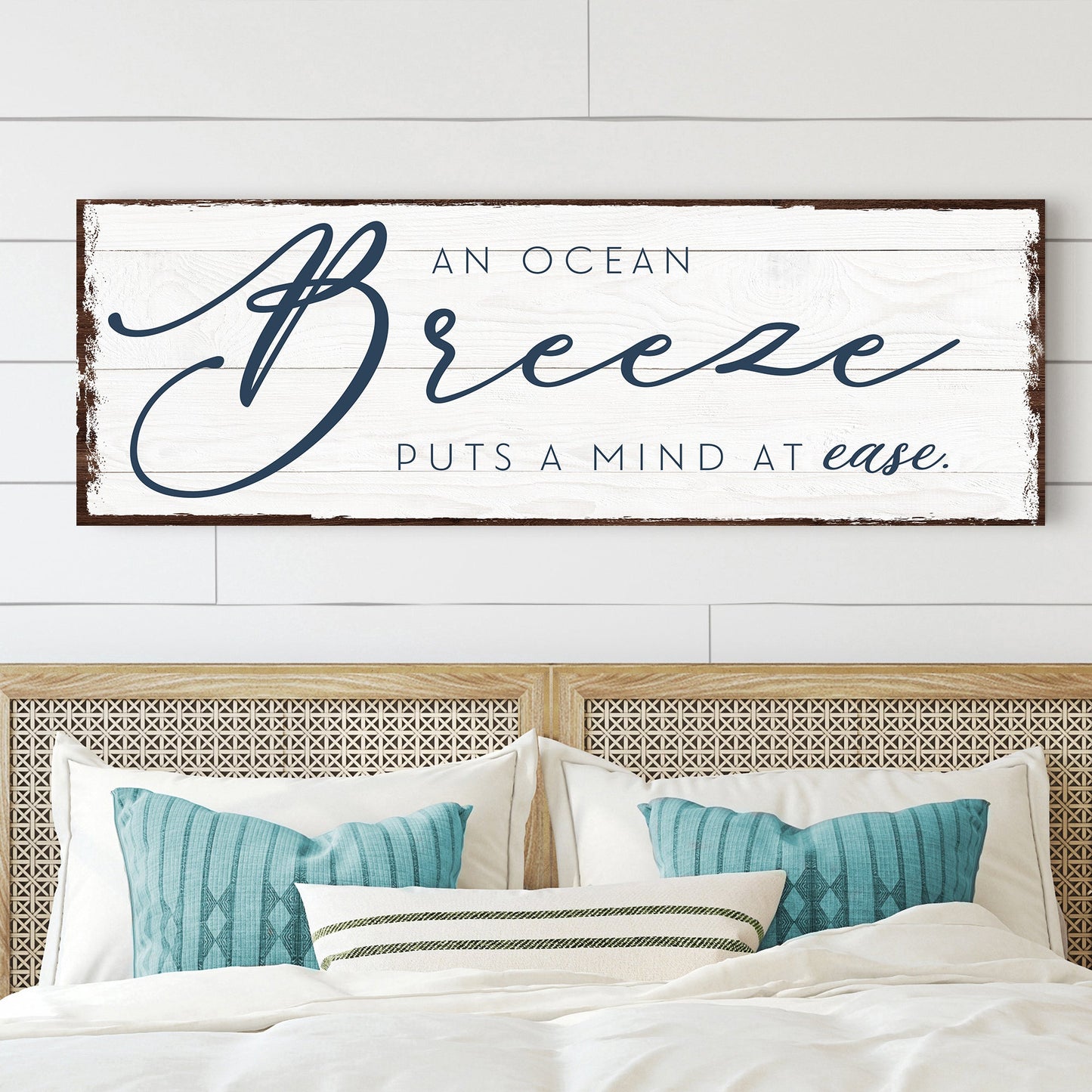 Canvas sign white wood by Tailored Canvases reading An Ocean Breeze Puts A Mind At Ease on Tampa Home & Garden Store