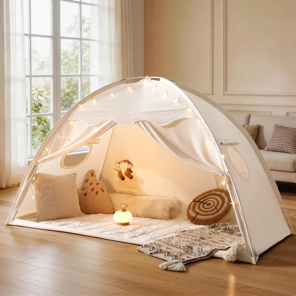 Tiny Land Versatile Kids Bed Tent & Play Tent in white fabric with string lights and plush toys on Tampa Home & Garden Store
