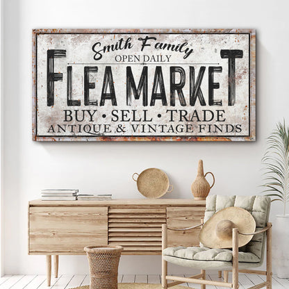 Family Flea Market sign on a rustic distressed canvas with bold FLEA MARKET lettering on Tampa Home & Garden Store