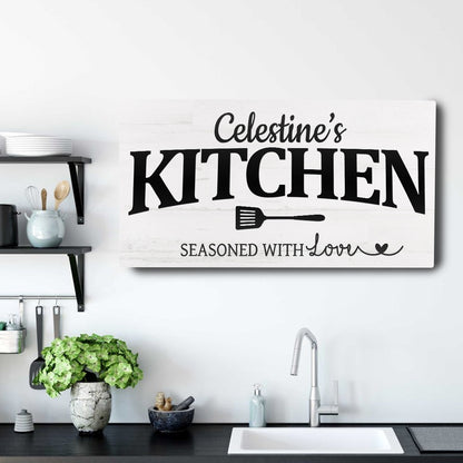 Canvas kitchen sign with distressed white wood, Celestine's KITCHEN text and spatula icon on Tampa Home & Garden Store