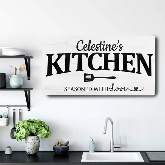 Canvas kitchen sign with distressed white wood, Celestine's KITCHEN text and spatula icon on Tampa Home & Garden Store