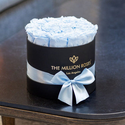 The Million Roses Classic Black Box with light blue roses and pale blue satin ribbon on Tampa Home & Garden Store