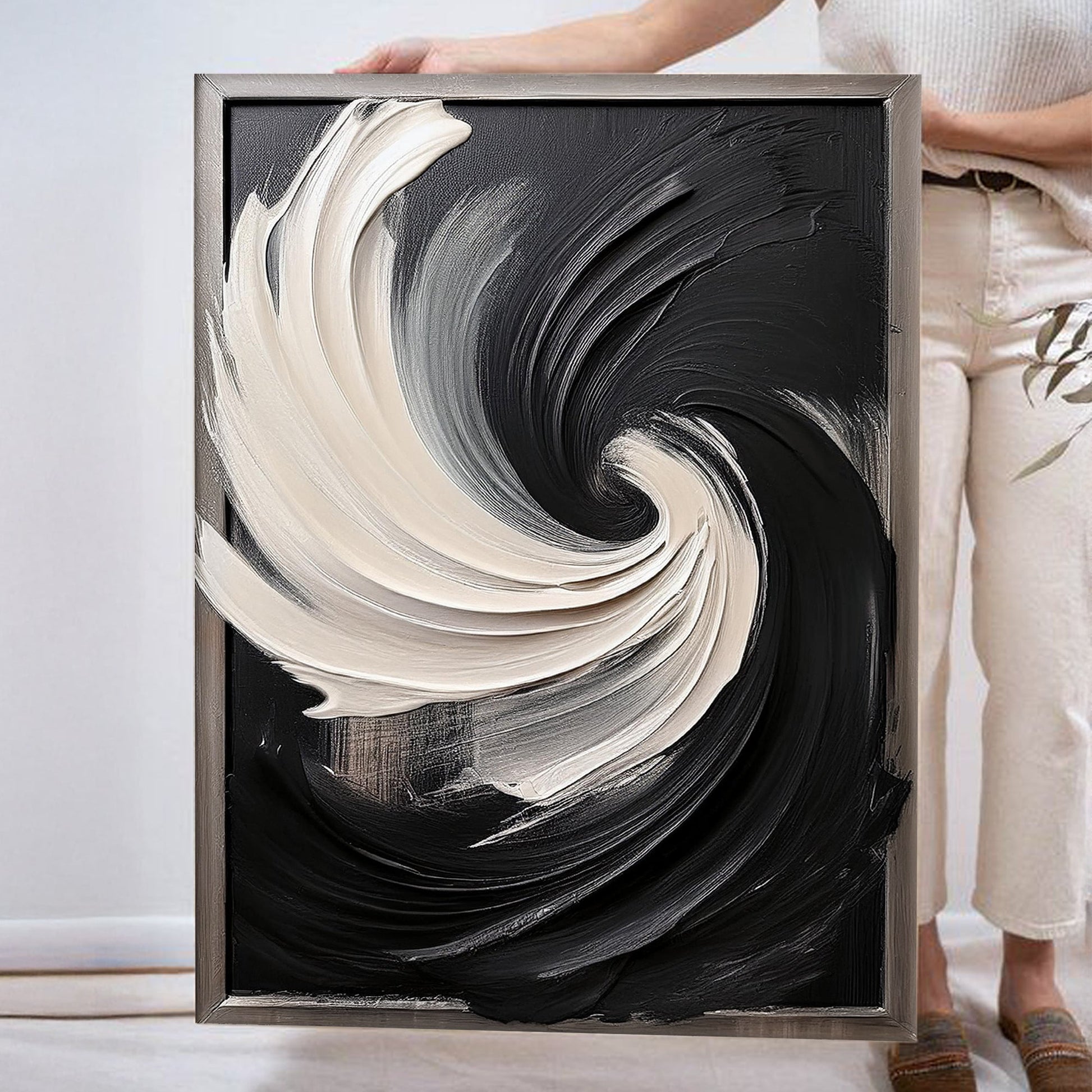 Black and White Vortex Abstract Wall Art canvas with cream and black swirls in a frame on Tampa Home & Garden Store