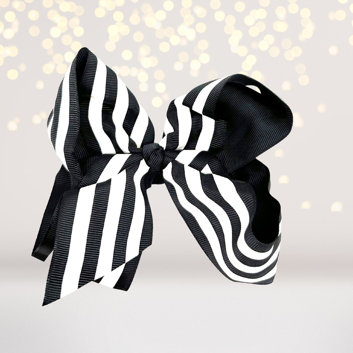 6 Inch Stripe Bow hair bow in oversized black and white grosgrain ribbon on Tampa Home & Garden Store