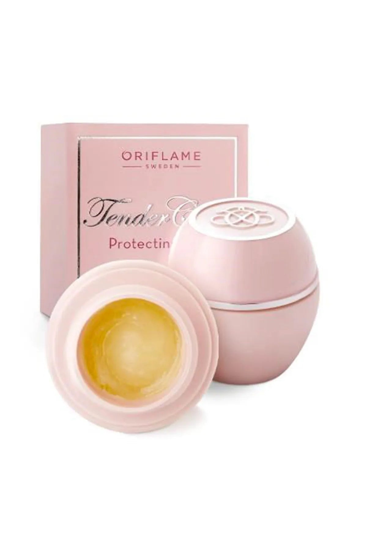 Tender Care Protecting Balm by Oriflame in pink spherical jar beside pink box with yellow balm on Tampa Home & Garden Store