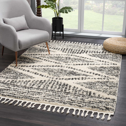 Fishhook Berber Shag Rug by Boutique Rugs in black and cream with fringe in living room on Tampa Home & Garden Store