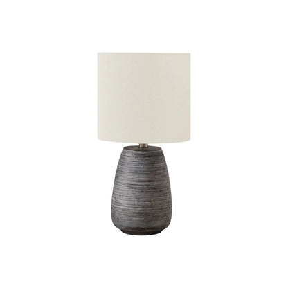 Table lamp by Unique Piece Furniture, ceramic textured base in gray with cream shade on Tampa Home & Garden Store