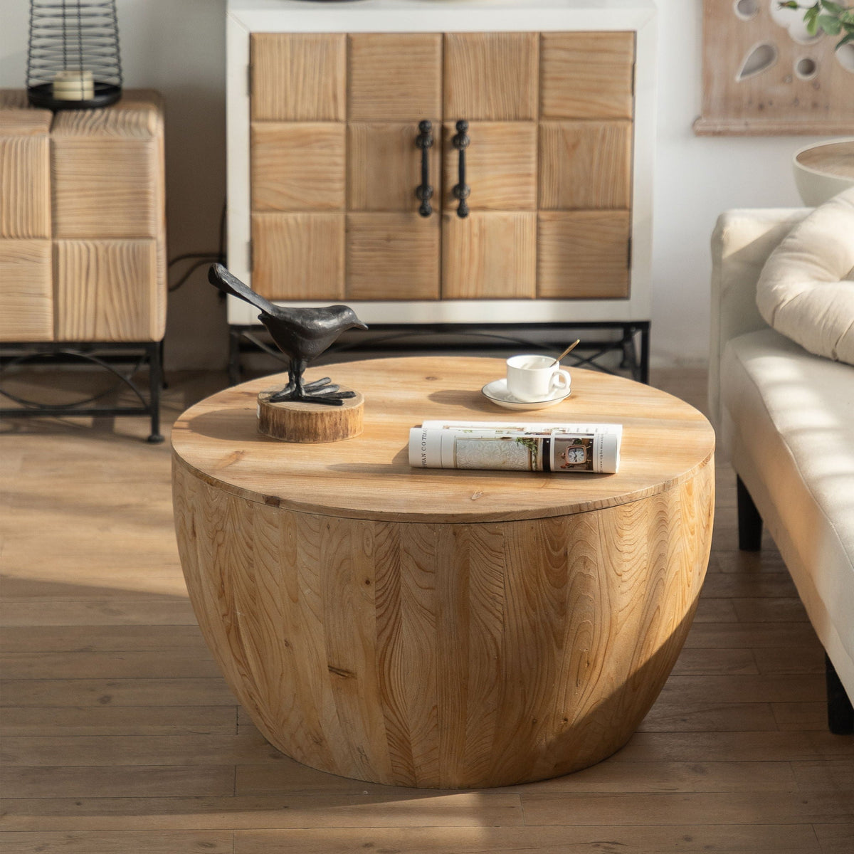 Vintage style barrel coffee table in natural wood with a round top and paneled sides on Tampa Home & Garden Store