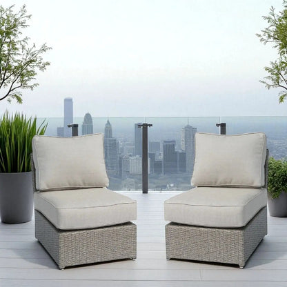 Armless patio chair set of 2 with beige cushions in a woven rattan base on Tampa Home & Garden Store