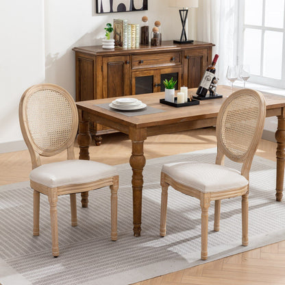 French style solid wood dining chairs with rattan backs, four-chair set around a table on Tampa Home & Garden Store