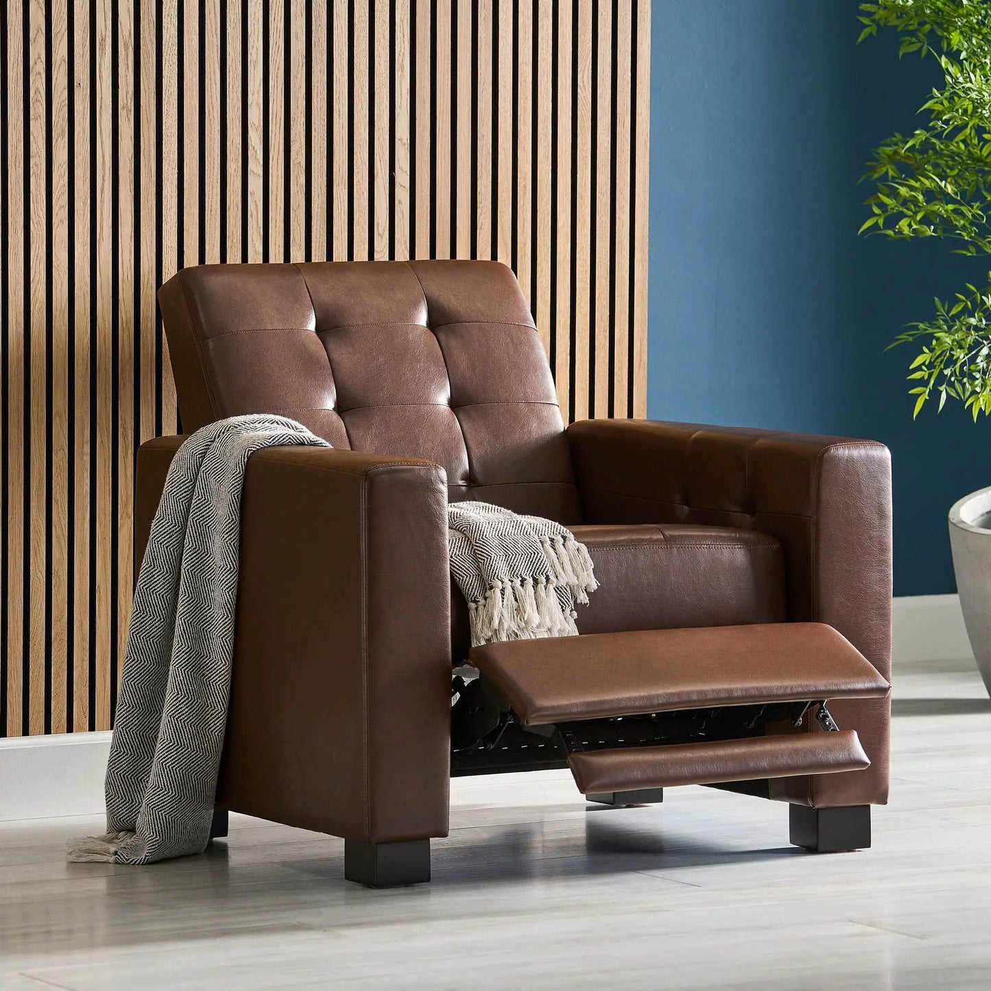 Langseth Contemporary Tufted Pushback Recliner in brown leather with extended footrest on Tampa Home & Garden Store