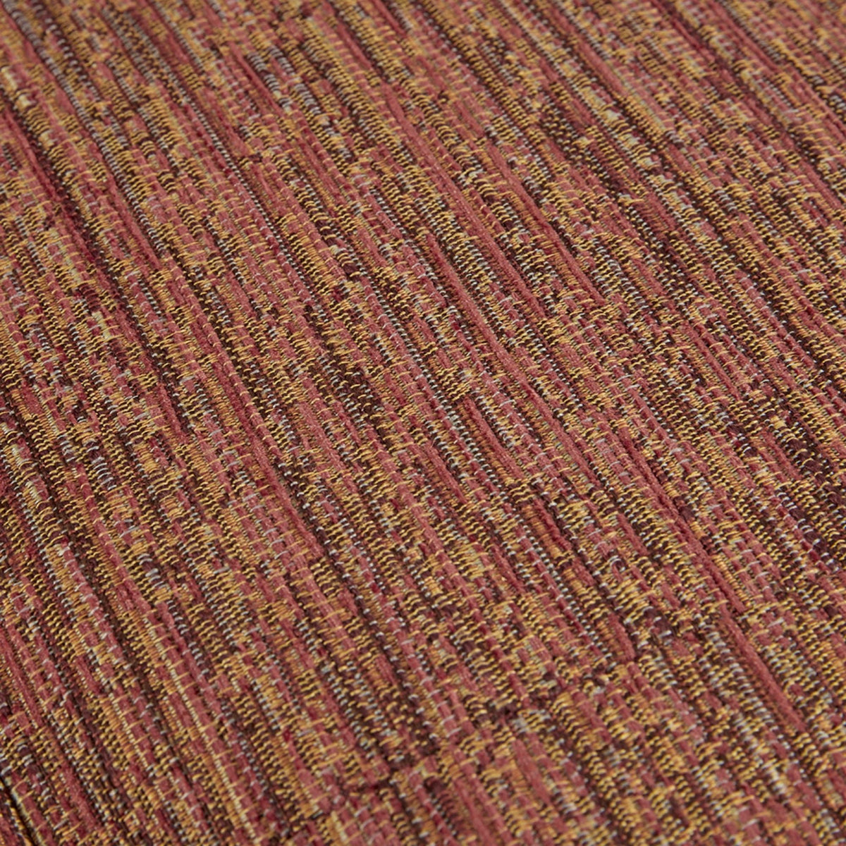 Armchairs upholstery fabric close-up with a red, orange, and mustard yellow woven pattern on Tampa Home & Garden Store