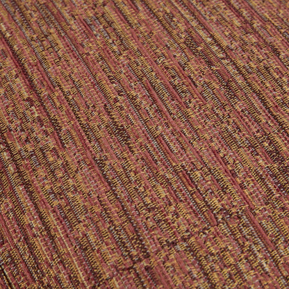 Armchairs upholstery fabric close-up with a red, orange, and mustard yellow woven pattern on Tampa Home & Garden Store