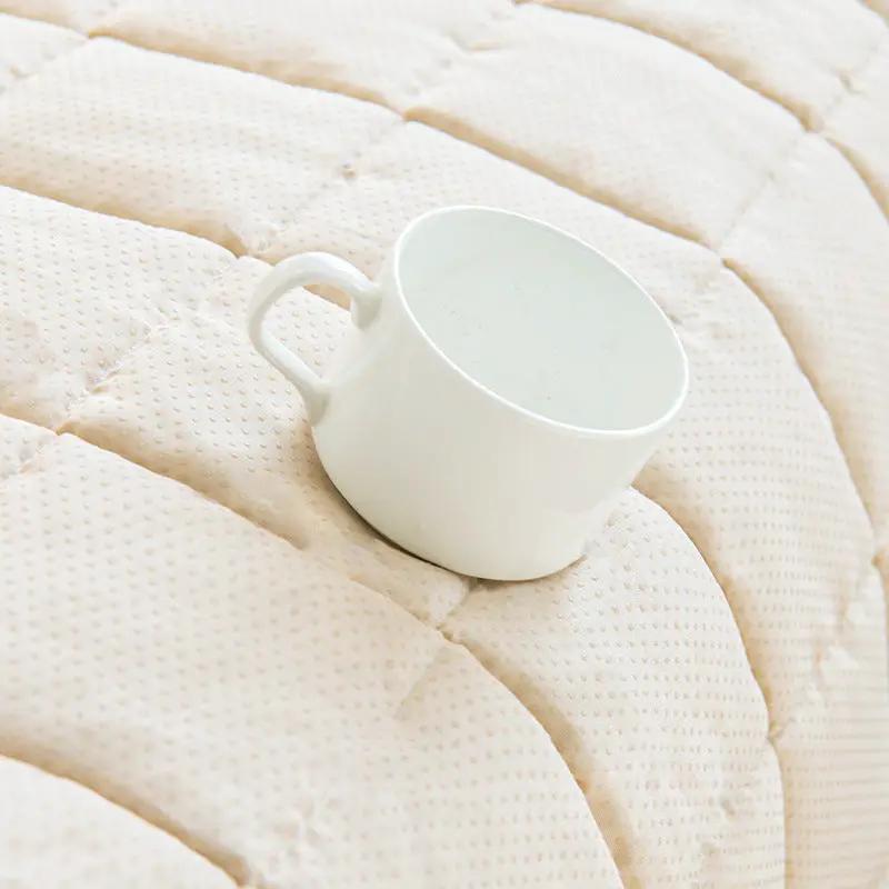 Simple Modern non-slip autumn and winter plush cushion on cream quilted fabric with a white mug on Tampa Home & Garden Store