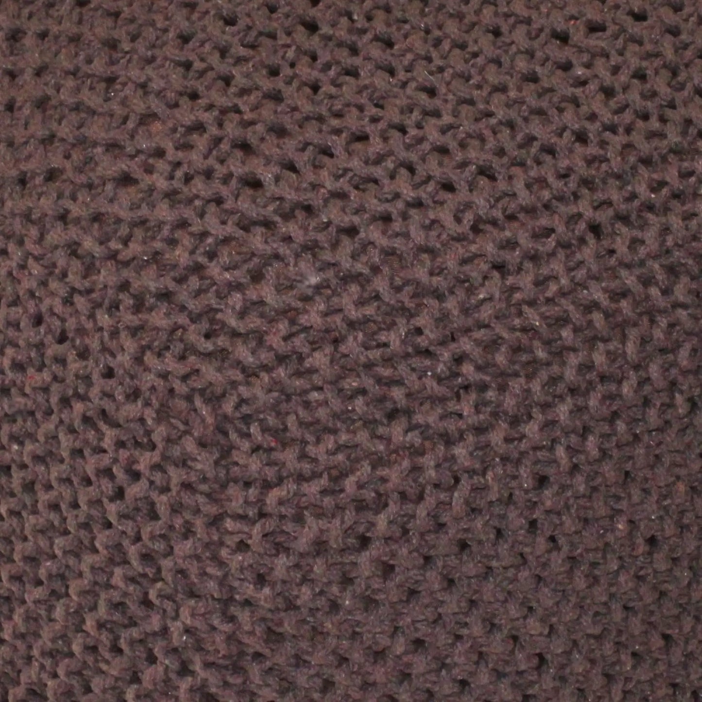 Brown loop-pile carpet texture close-up; warm woven floor covering on Tampa Home & Garden Store