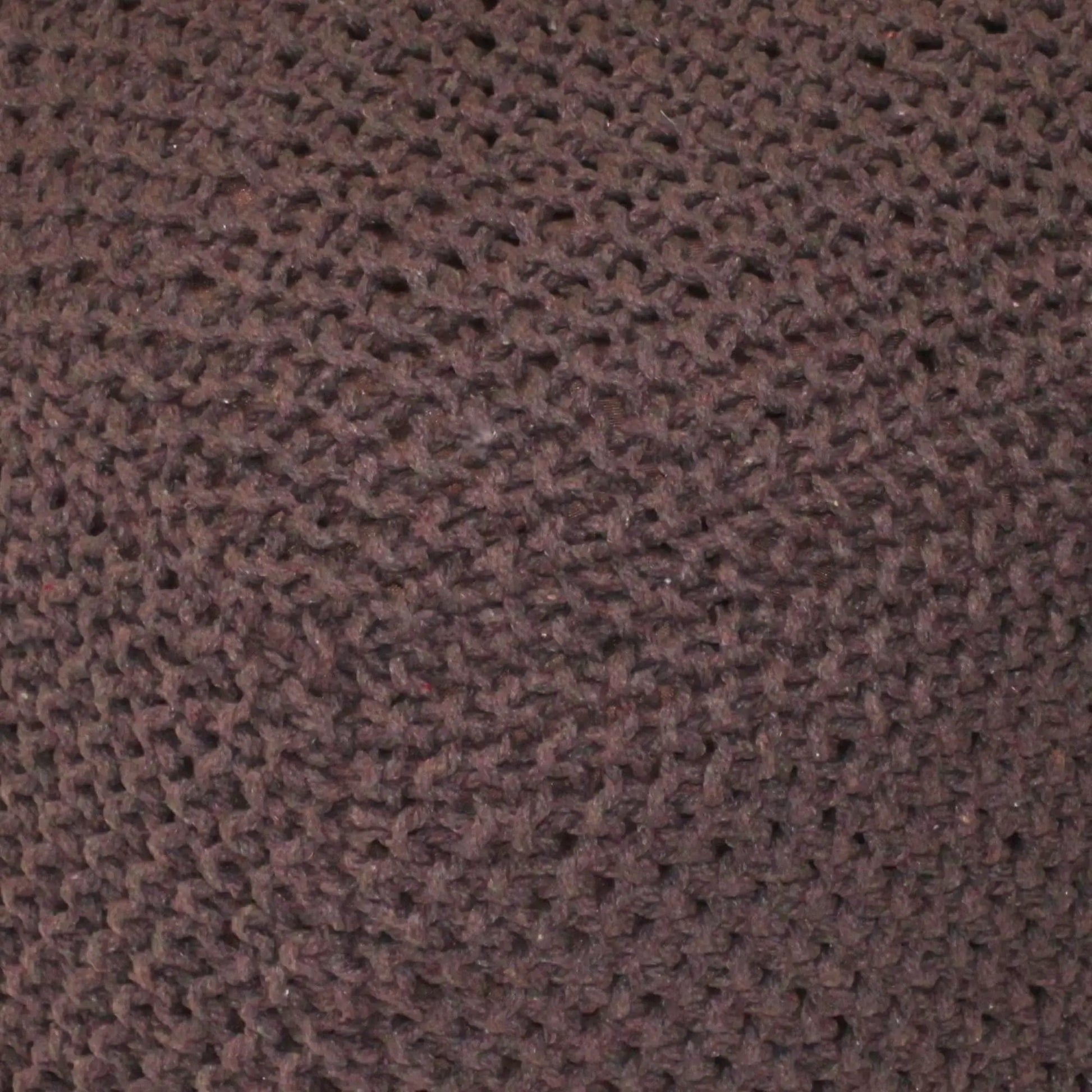 Brown loop-pile carpet texture close-up; warm woven floor covering on Tampa Home & Garden Store