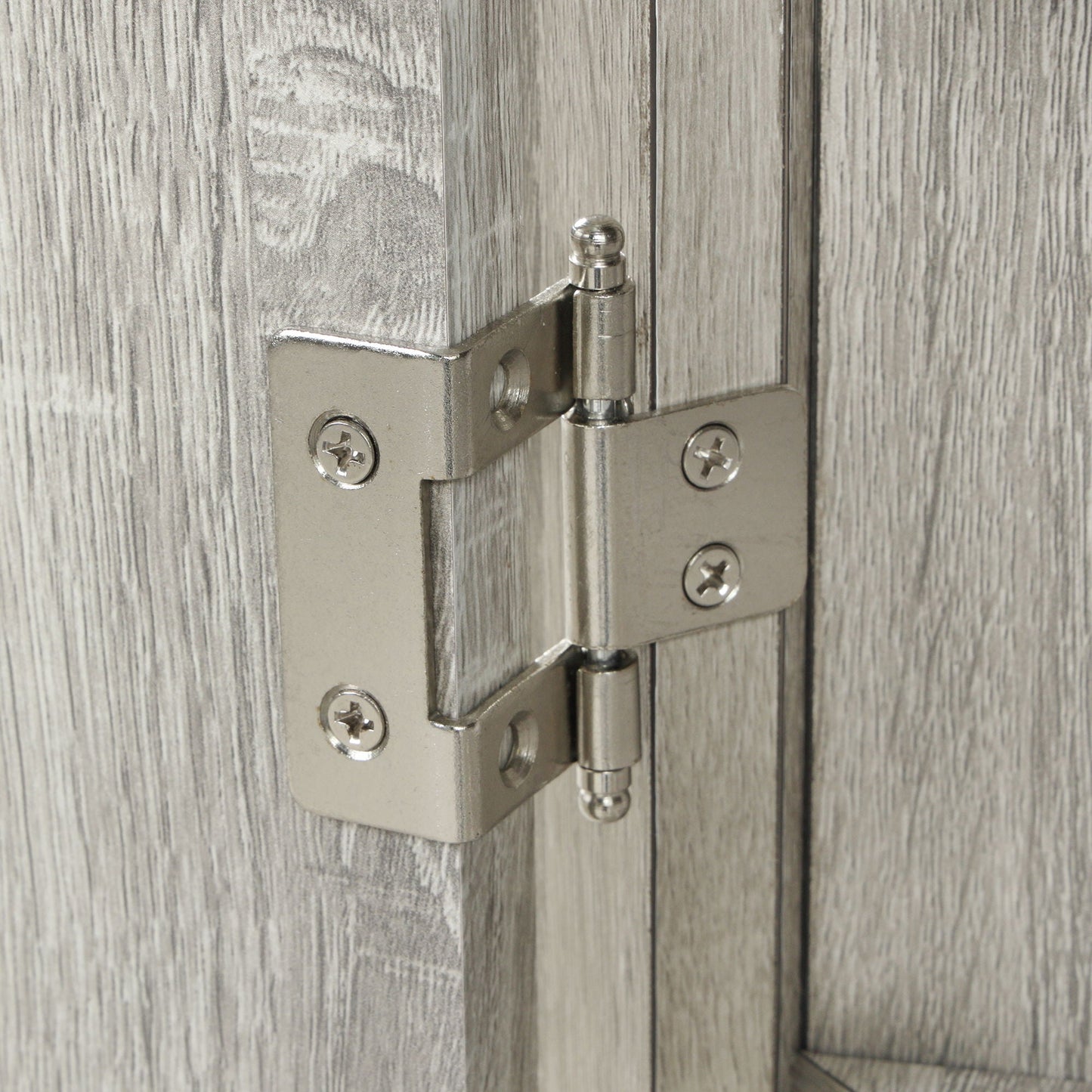 HouseOfZazla linen cabinet hinge close-up on gray wood grain door on Tampa Home & Garden Store