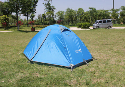 Blue outdoor double camping tent in grassy field on Tampa Home & Garden Store