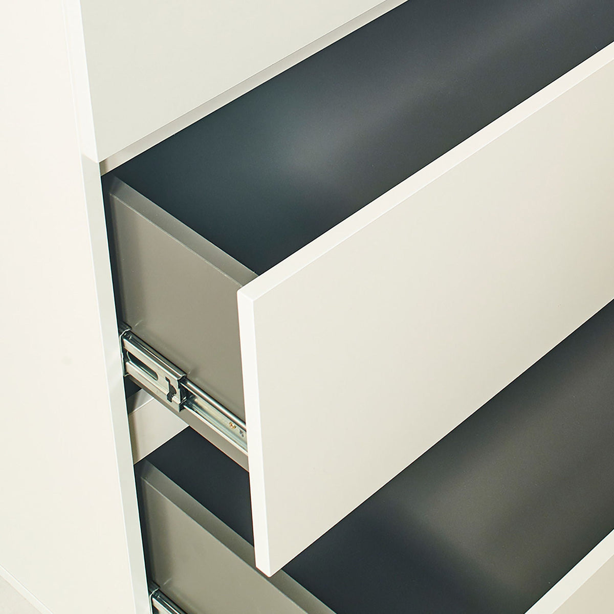 Contemporary white wood chest with soft-closing drawers and metal drawer slides on Tampa Home & Garden Store