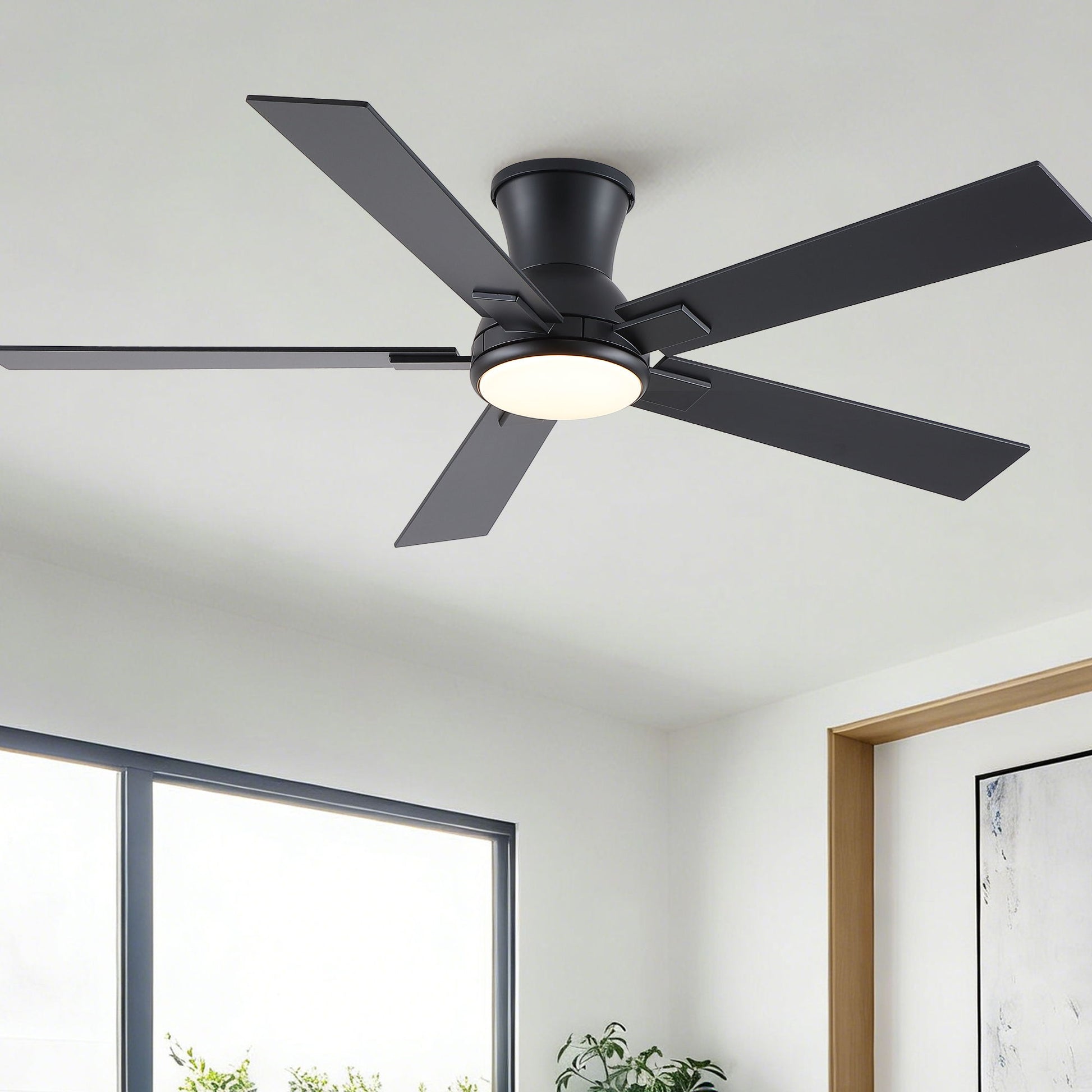 Low-profile flush-mount ceiling fan with integrated LED light and matte gray blades on Tampa Home & Garden Store