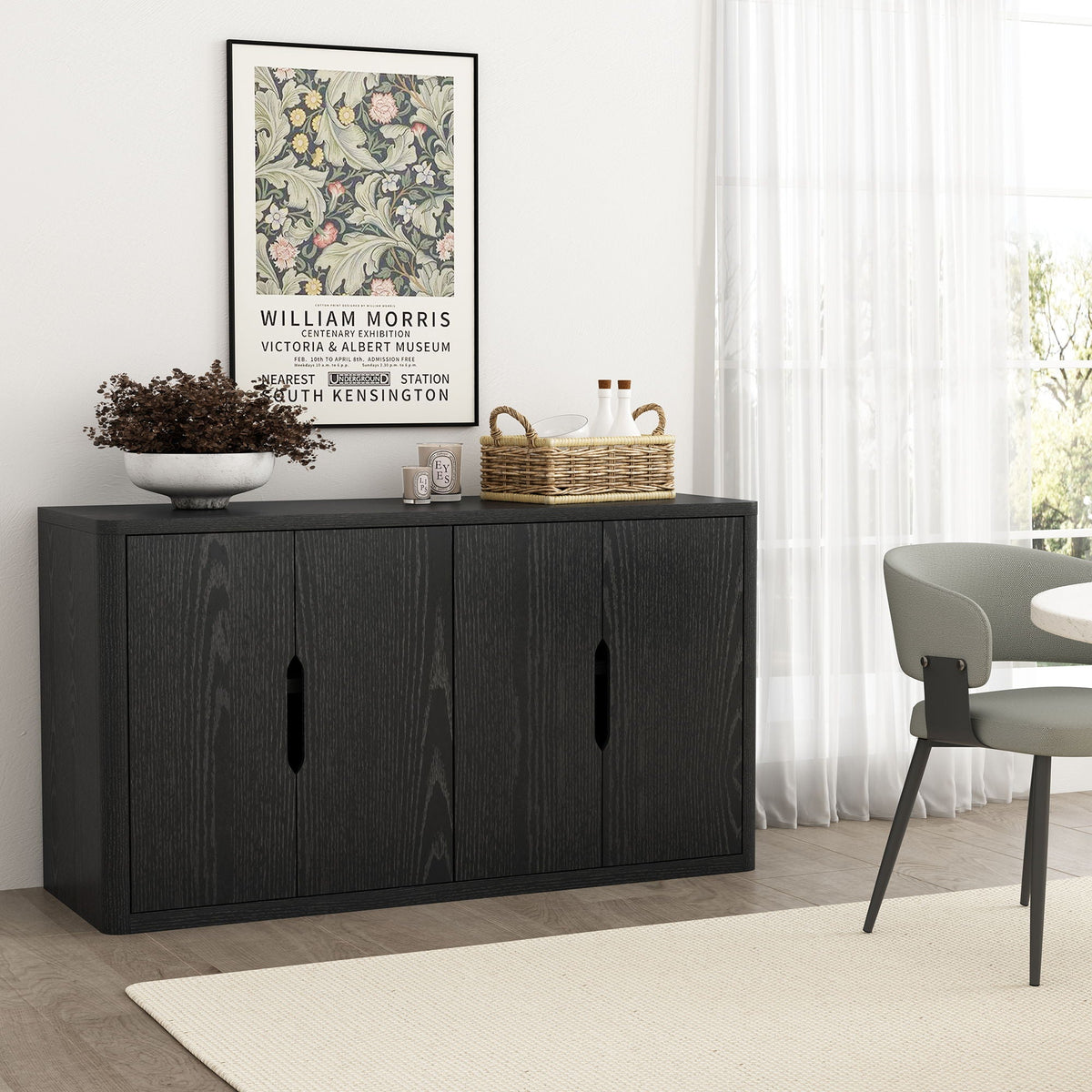Rivington Sideboard in black wood grain with slit doors, styled with basket and art on Tampa Home & Garden Store
