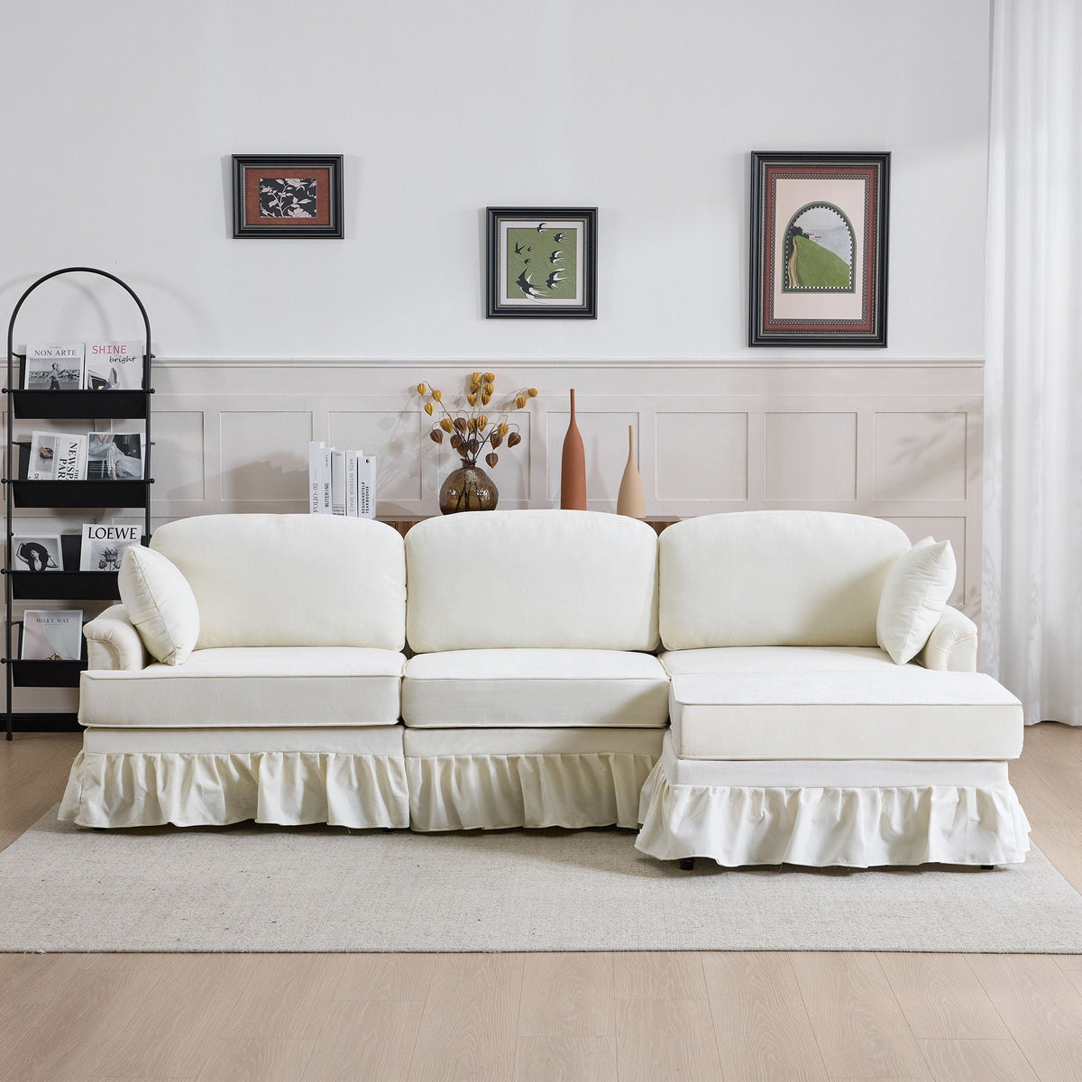 L-shaped white sectional sofa with ottoman, removable ruffled skirt, flared arms, HouseOfZazla on Tampa Home & Garden Store
