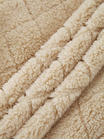 Women's fuzzy zip-up jacket beige sherpa fleece close-up fabric on Tampa Home & Garden Store