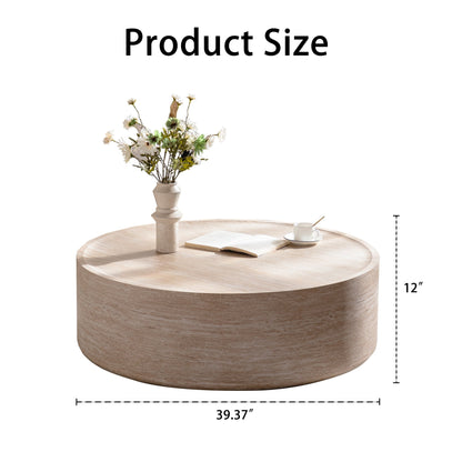 Round natural wood coffee table with beige stone vase of white flowers and a cup, open book on Tampa Home & Garden Store