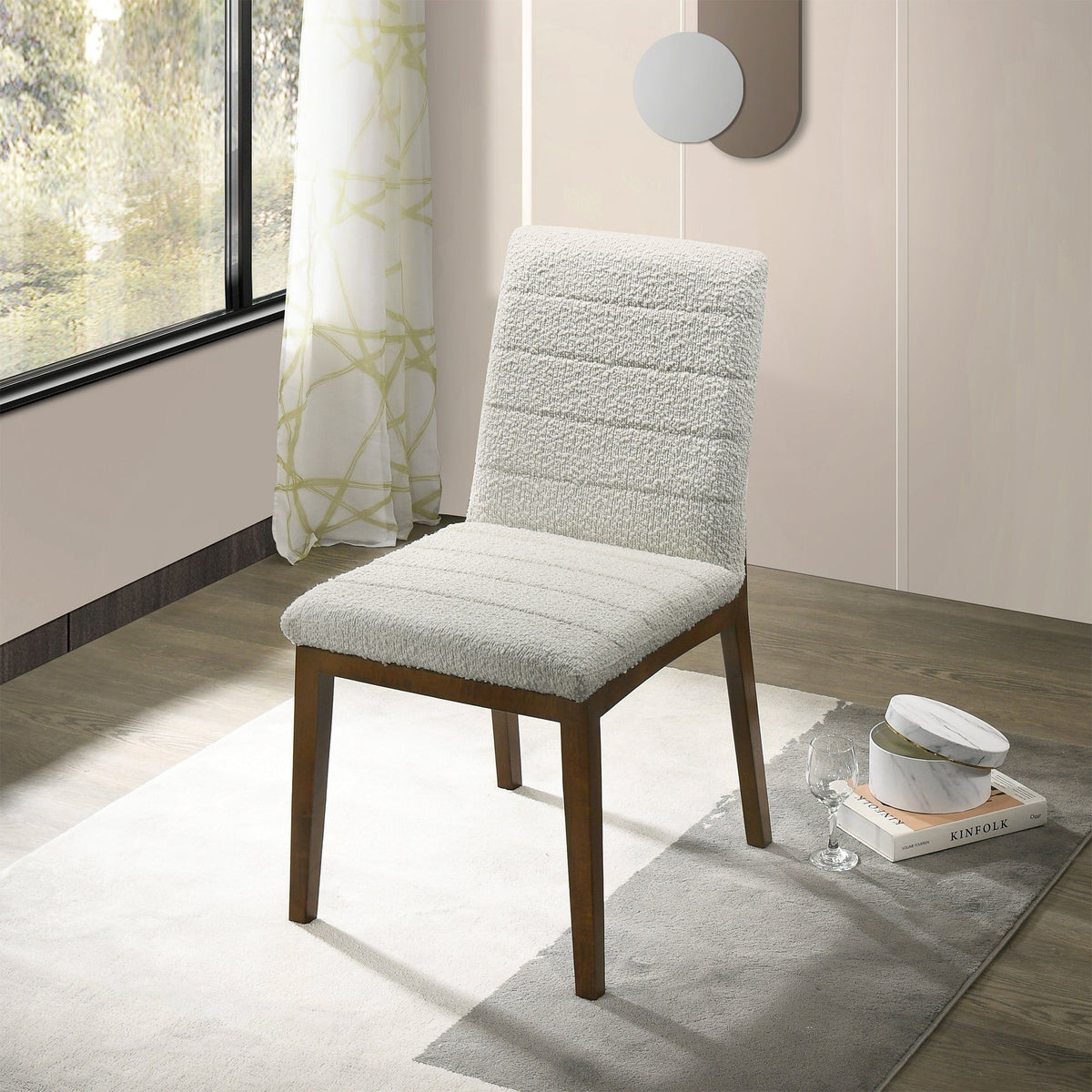 Modern dining chair set with solid wood base; two light gray boucle chairs with dark wood legs on Tampa Home & Garden Store