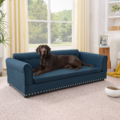 Oversized Pet Sofa blue fabric with studded trim dog lounging on it on Tampa Home & Garden Store