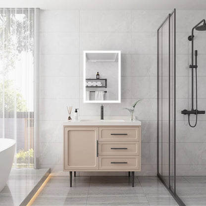 Lighted LED medicine cabinet with backlit mirror and defogger above beige vanity on Tampa Home & Garden Store