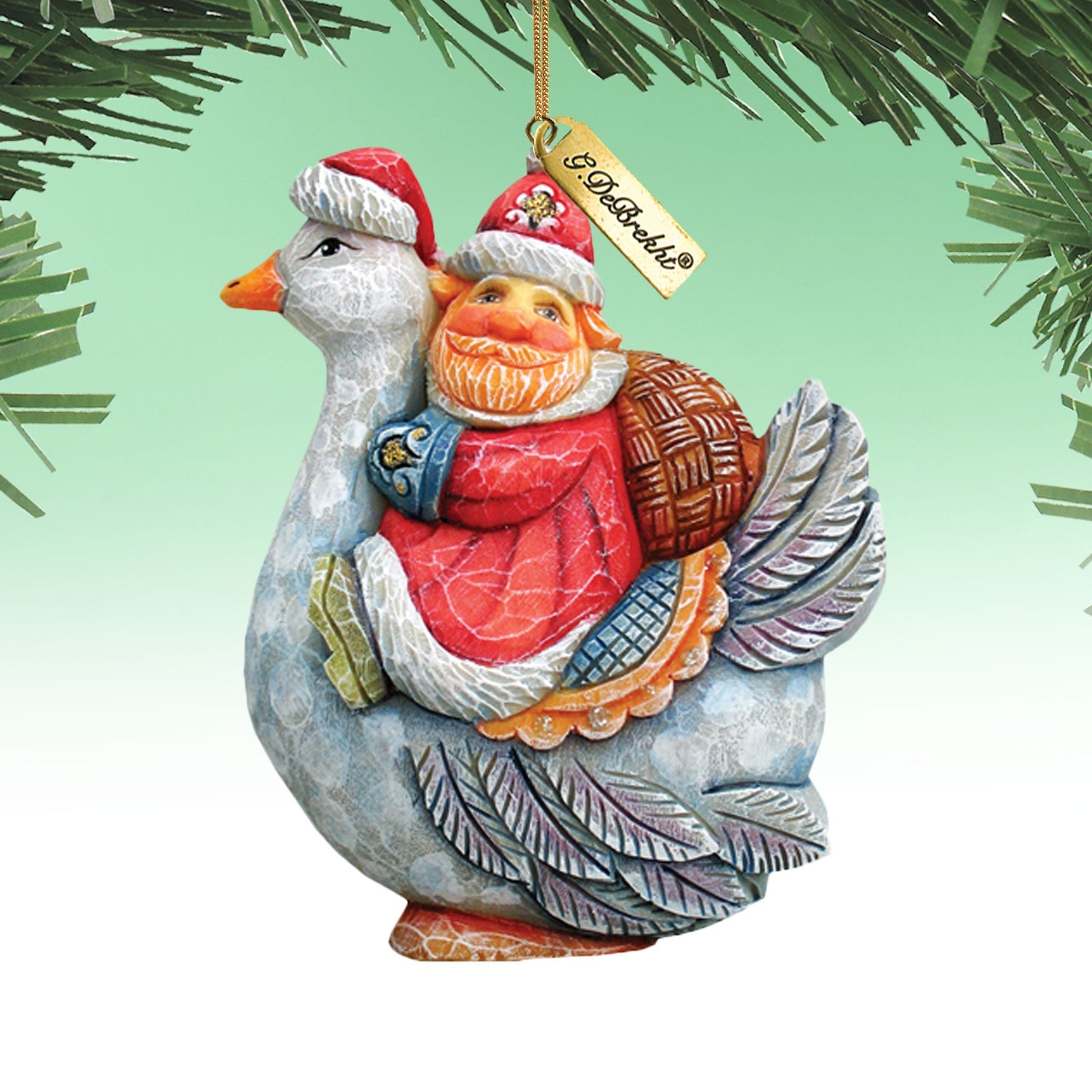 Santa on goose sculpted ornament featuring two figures, by G. DeBrekht, red hat on Tampa Home & Garden Store