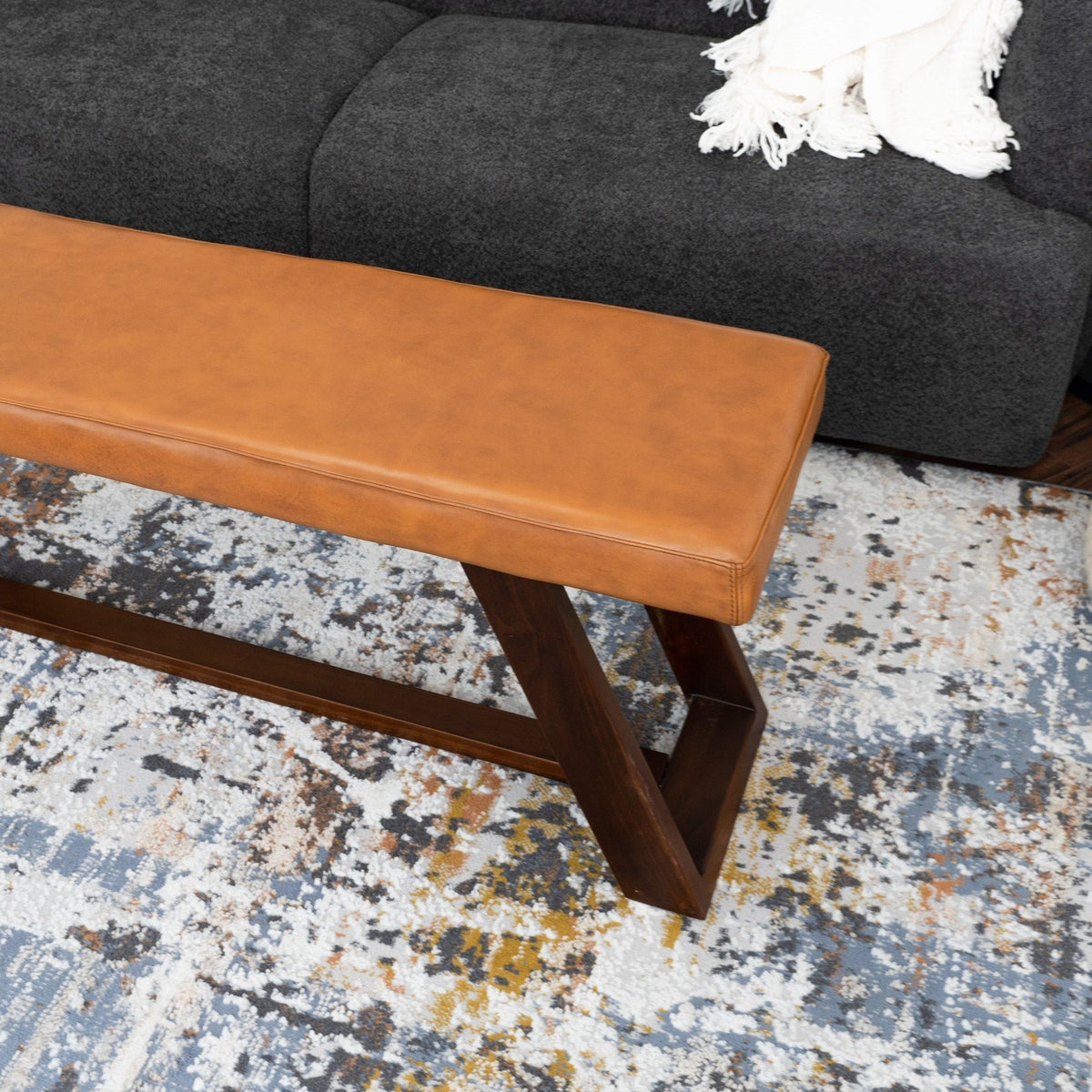 Light brown genuine leather upholstered bench with hand stitching and wooden legs HouseOfZazla on Tampa Home & Garden Store
