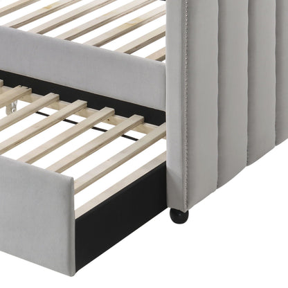 Peridot twin daybed frame in dove gray fabric with nailhead trim and wooden slats on Tampa Home & Garden Store