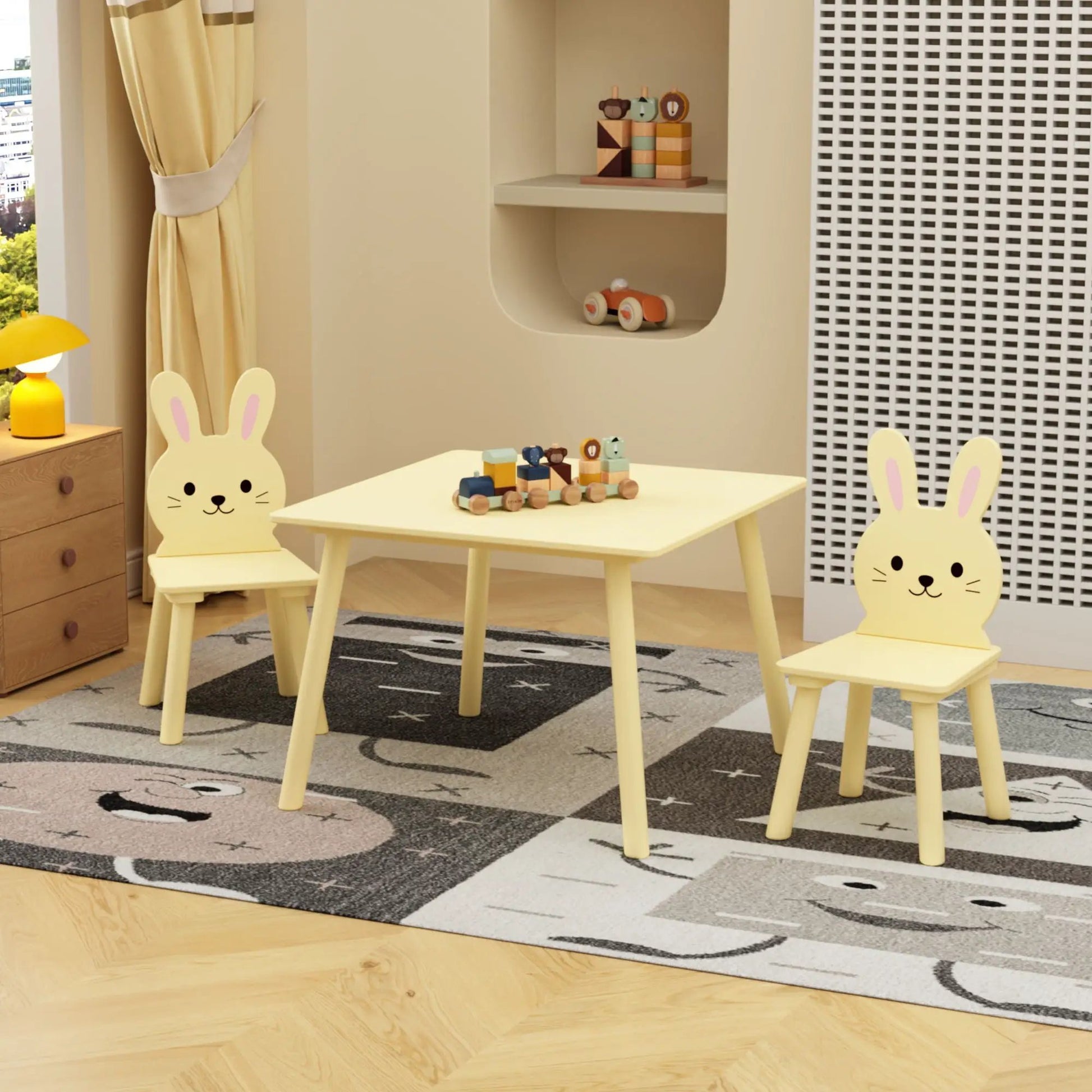 Table and chair set with two yellow bunny-back chairs for toddlers in a bright kids room on Tampa Home & Garden Store