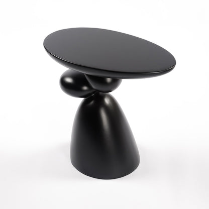 Lucky Stone Shaped End Table with sculptural black pedestal base by HouseOfZazla on Tampa Home & Garden Store