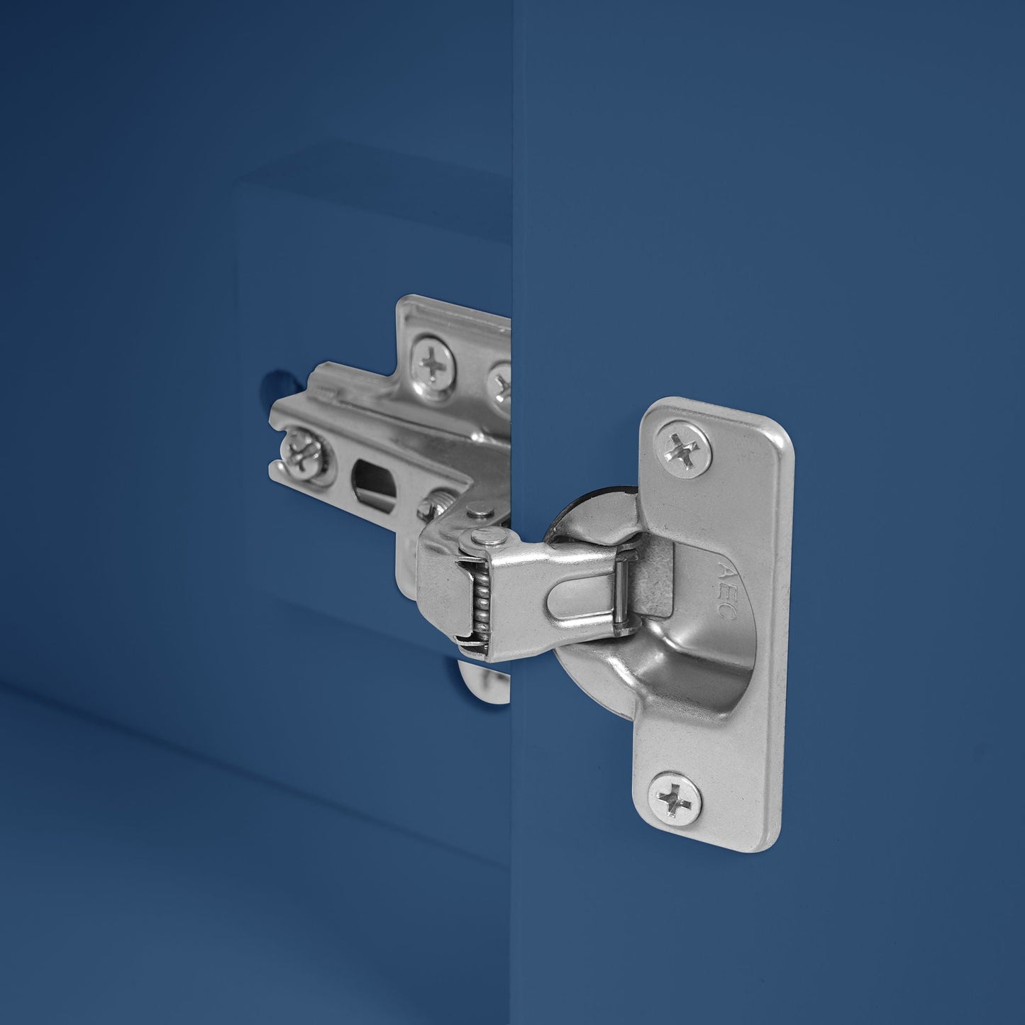HouseOfZazla silver soft-close vanity hinge on deep blue cabinet door on Tampa Home & Garden Store